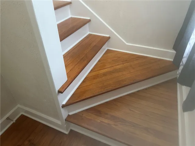 a kitchen with a refrigerator a sink and dishwasher