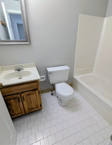 a bathroom with a sink and a toilet