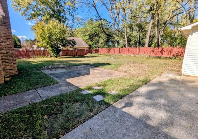 a view of an outdoor space with swimming pool
