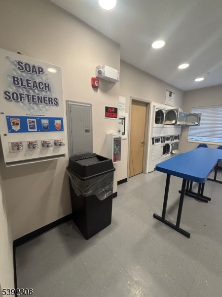 241 Ridge Road North Arlington, NJ 07031 - Photo 11 of 14 a room with furniture a washer and dryer