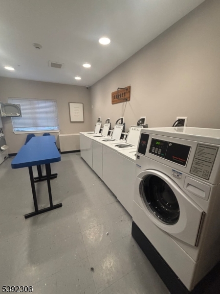 241 Ridge Road North Arlington, NJ 07031 - Photo 12 of 14 a view of kitchen and washer and dryer