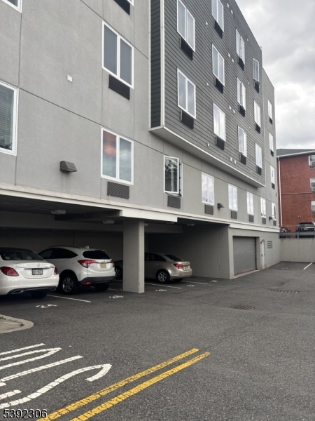 241 Ridge Road North Arlington, NJ 07031 - Photo 13 of 14 a car parked in front of a building