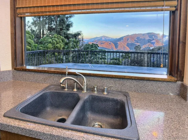 a kitchen sink with a stove