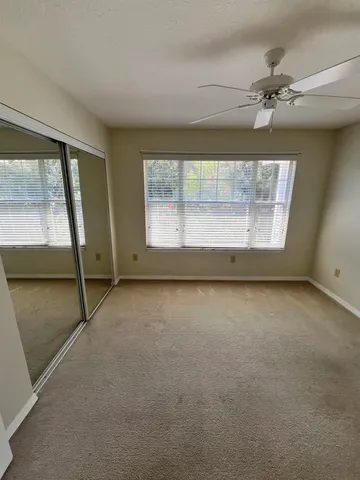 an aerial view of a house with outdoor space