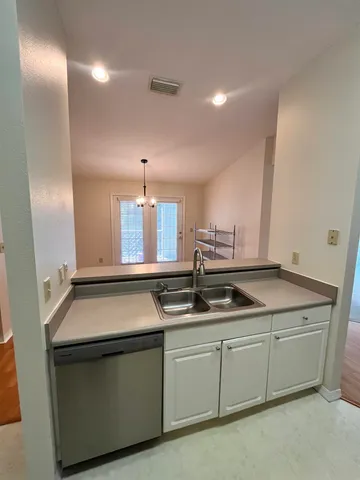 a bathroom with a toilet and a bath tub