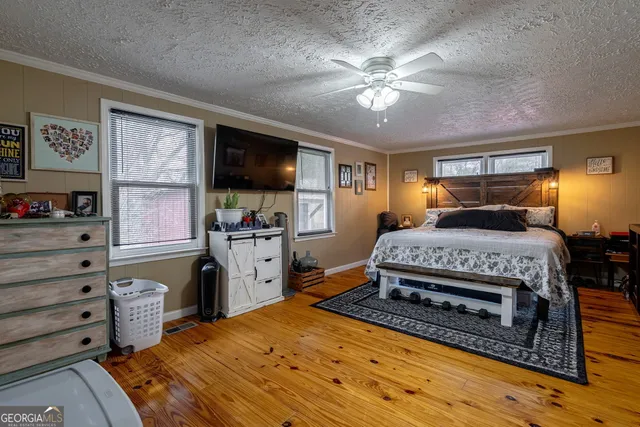 a bathroom with a sink and a window