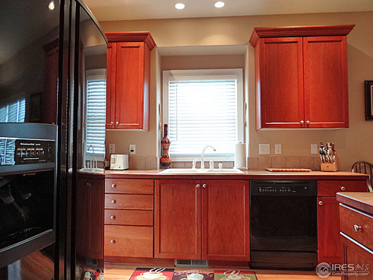 6808 16th Street Road Greeley, CO 80634 - Photo 11 of 25 Cherry Cabinets
