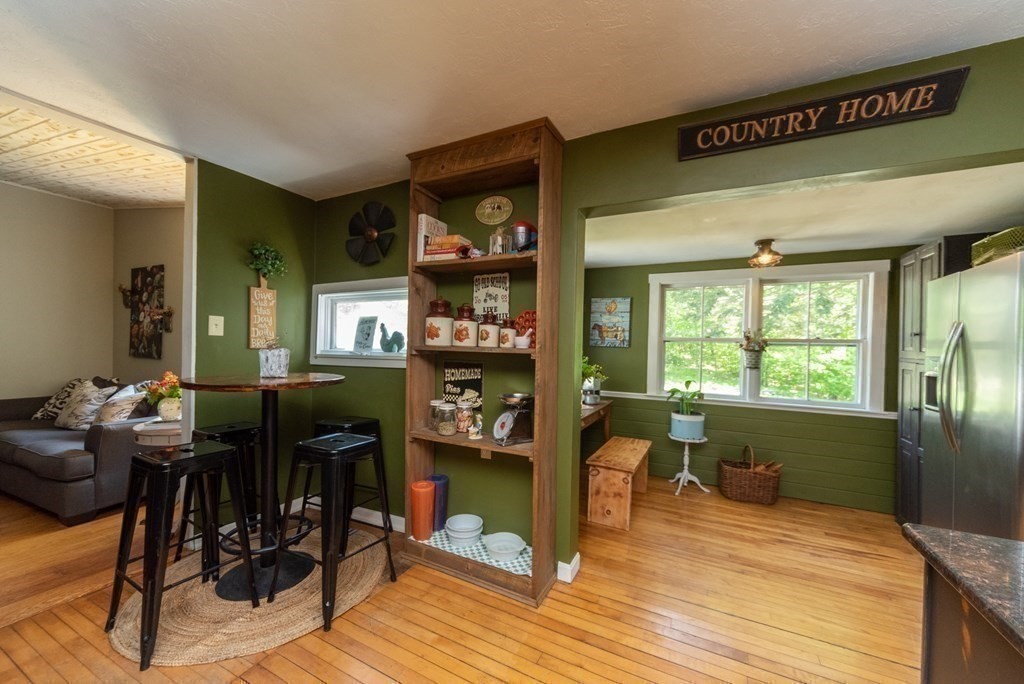1423 Piper Road Ashby, MA 01431 - Photo 14 of 42 a view of a livingroom with furniture window and wooden floor