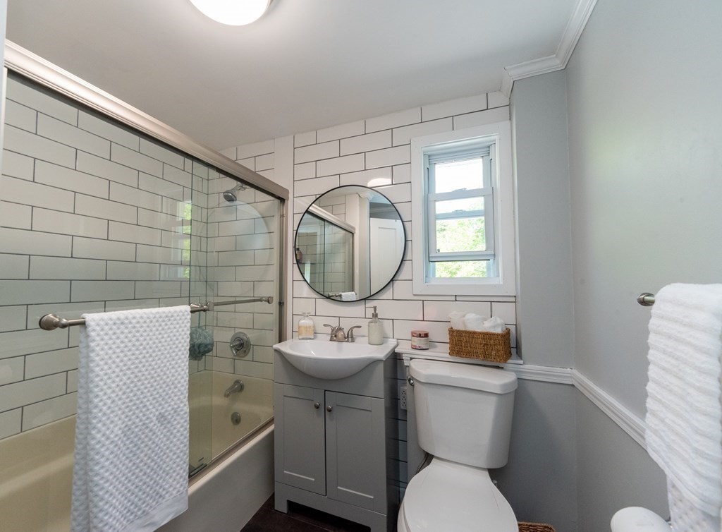 1423 Piper Road Ashby, MA 01431 - Photo 27 of 42 a bathroom with a toilet sink and mirror
