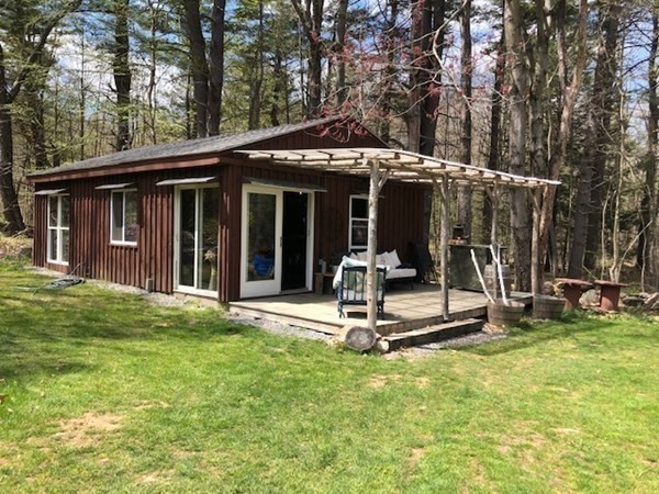 1423 Piper Road Ashby, MA 01431 - Photo 28 of 42 a view of a house with backyard porch and sitting area
