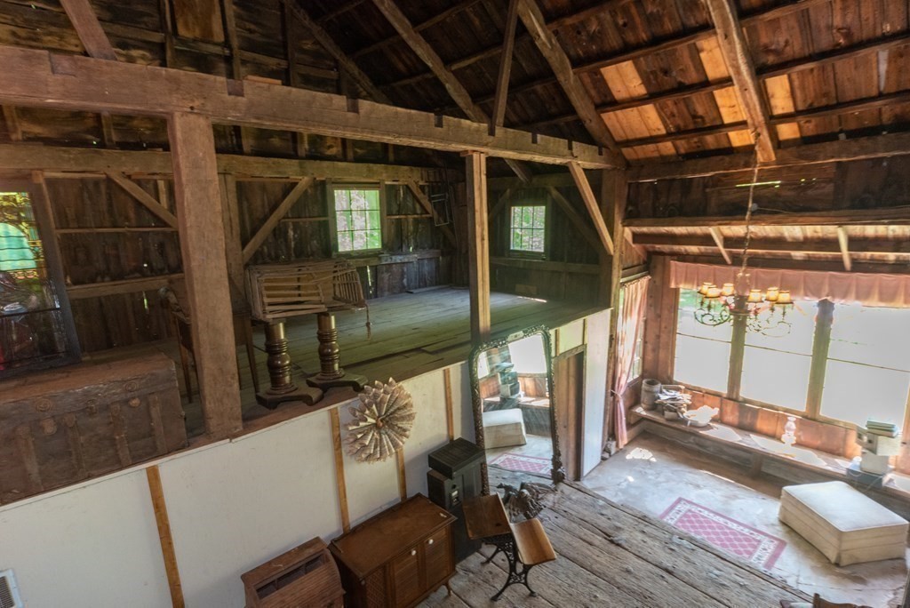 1423 Piper Road Ashby, MA 01431 - Photo 35 of 42 a view of a porch with wooden chairs