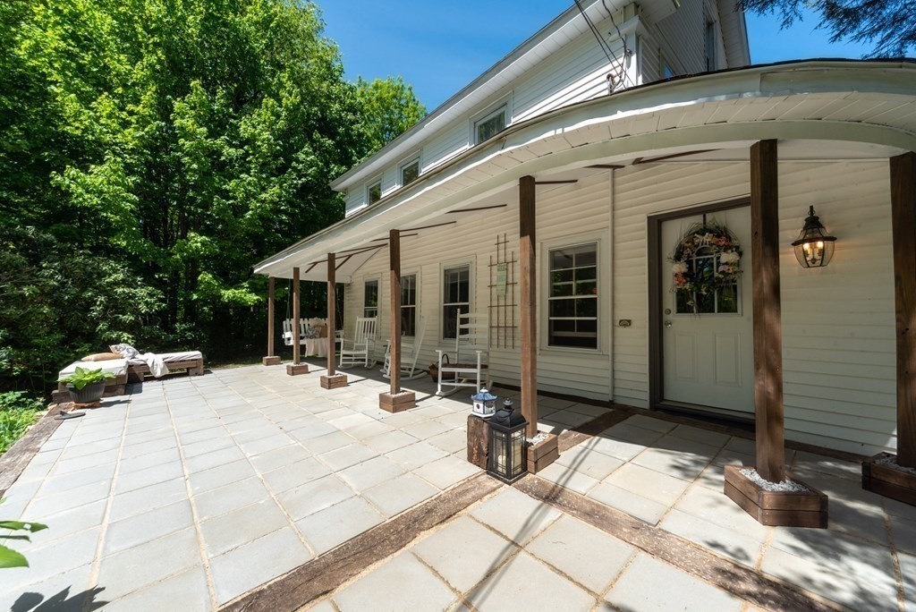 1423 Piper Road Ashby, MA 01431 - Photo 4 of 42 a view of a house with yard and sitting area