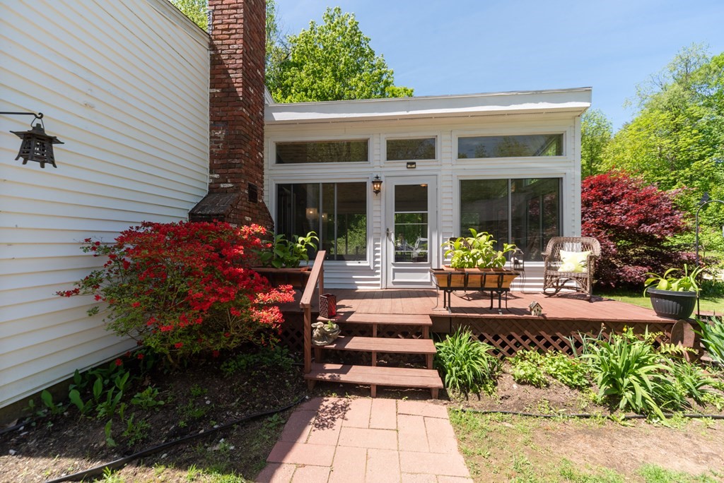 1423 Piper Road Ashby, MA 01431 - Photo 41 of 42 a front view of a house with garden