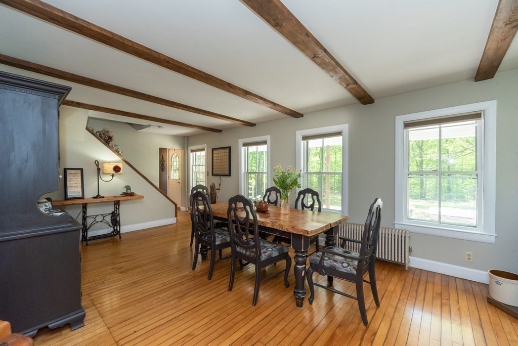 1423 Piper Road Ashby, MA 01431 - Photo 8 of 42 a view of a dining room with furniture and wooden floor