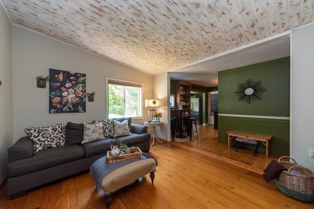 1423 Piper Road Ashby, MA 01431 - Photo 10 of 42 a living room with furniture and wooden floor