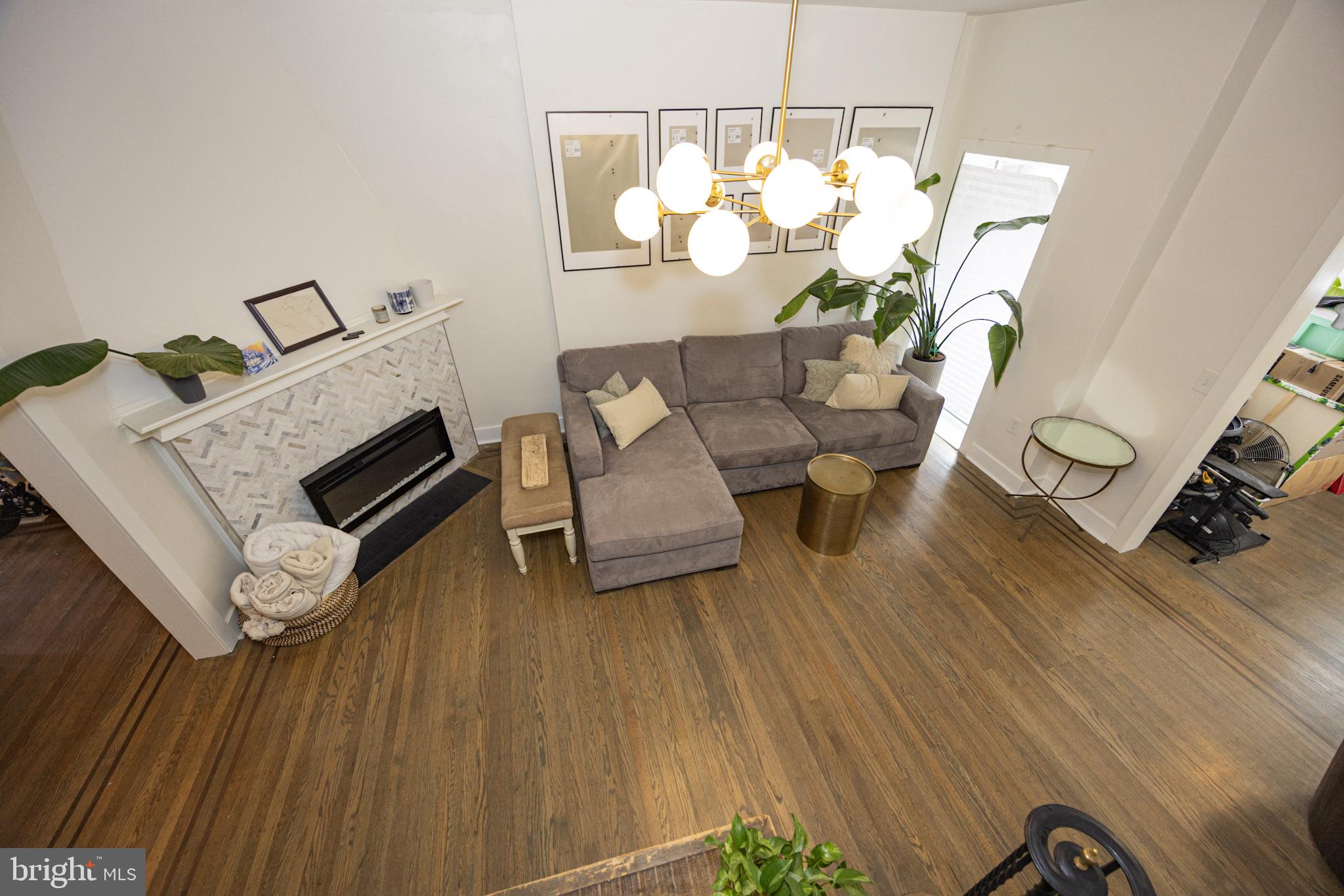 411 Vernon Road Philadelphia, PA 19119 - Photo 13 of 49 a living room with furniture and a wooden floor