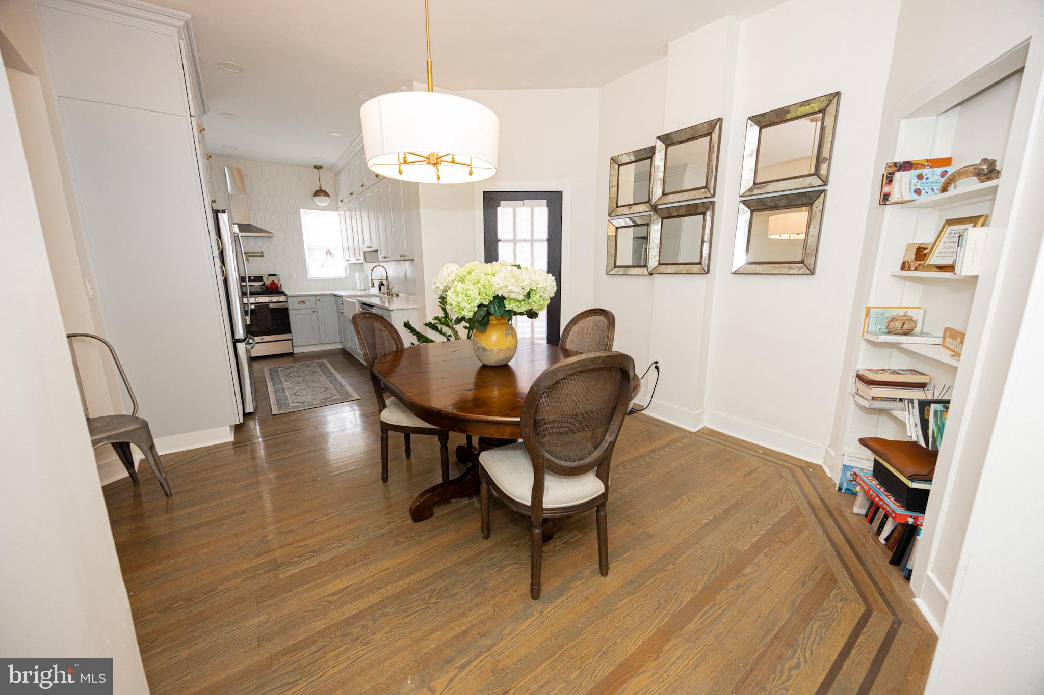 411 Vernon Road Philadelphia, PA 19119 - Photo 14 of 49 a view of a dining room with furniture and wooden floor
