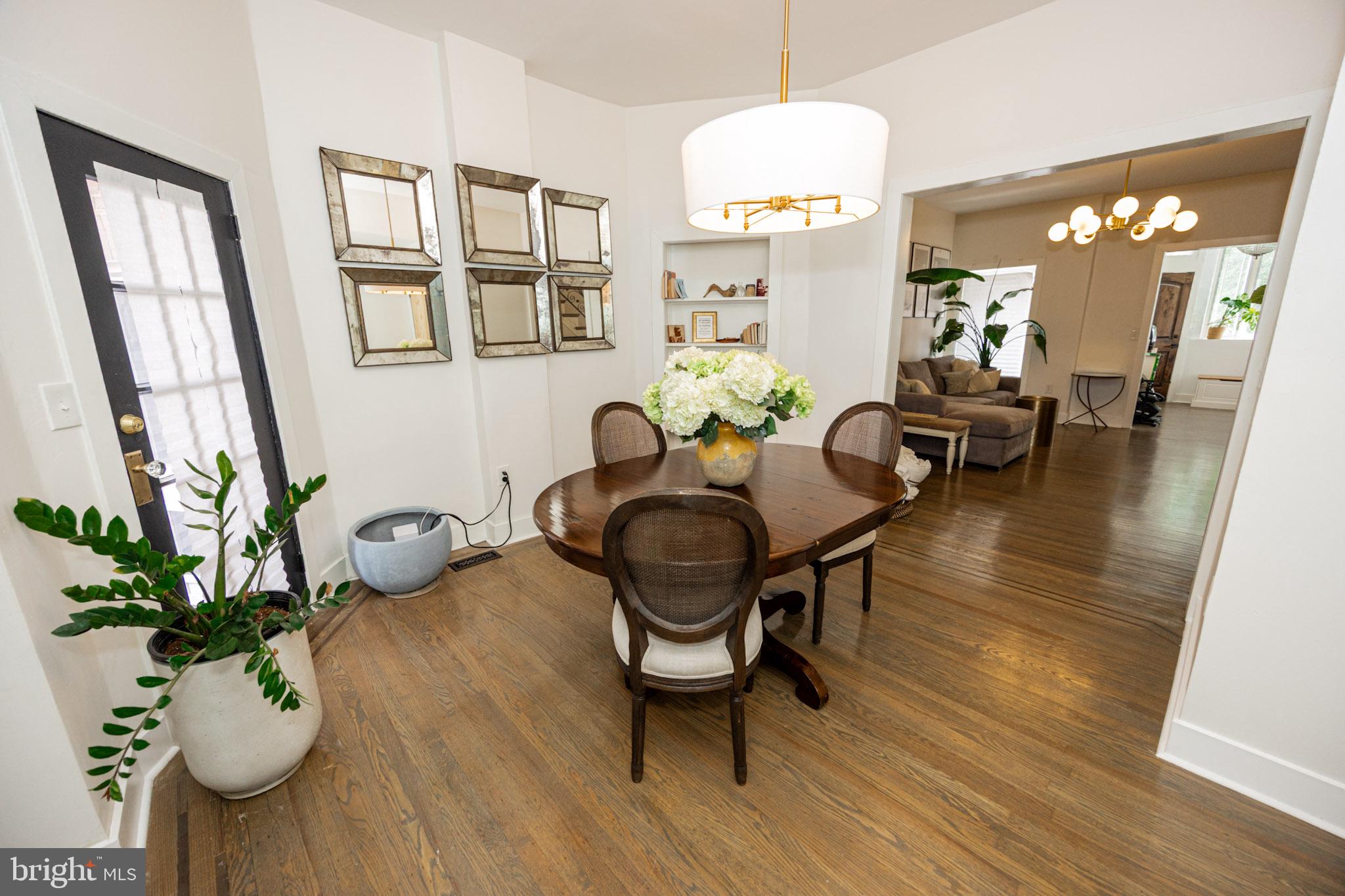 411 Vernon Road Philadelphia, PA 19119 - Photo 15 of 49 a view of a dining room with furniture window and wooden floor
