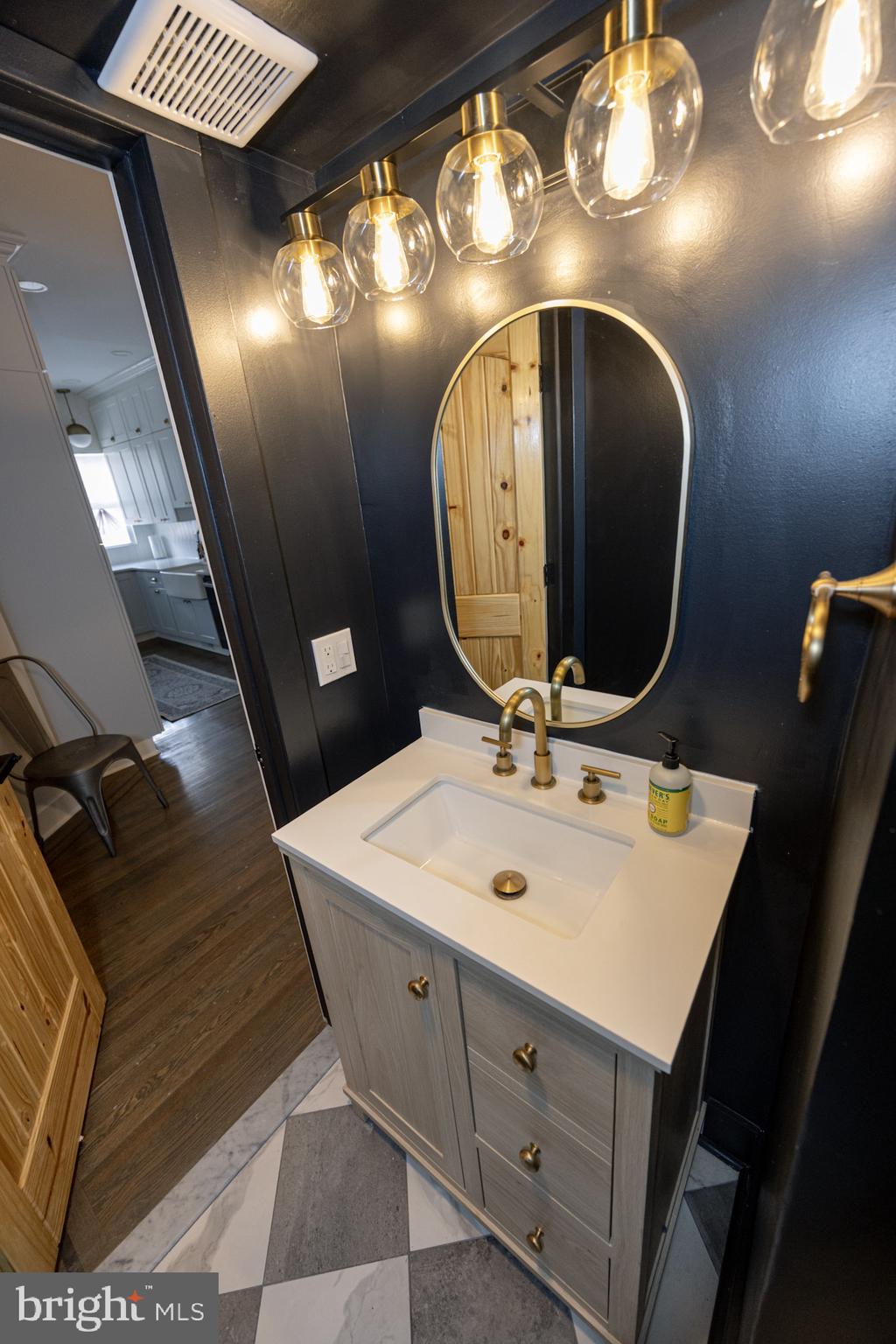 411 Vernon Road Philadelphia, PA 19119 - Photo 17 of 49 a bathroom with a sink and a mirror