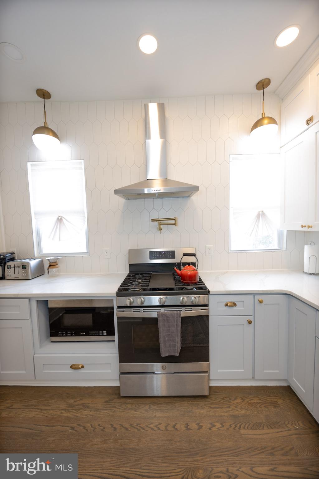411 Vernon Road Philadelphia, PA 19119 - Photo 25 of 49 a kitchen with a stove and a sink