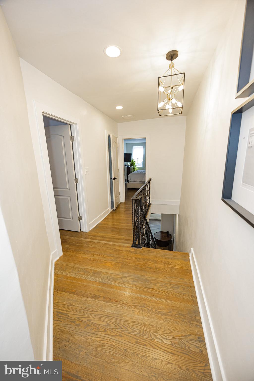 411 Vernon Road Philadelphia, PA 19119 - Photo 30 of 49 a bed room with a bed and a mirror