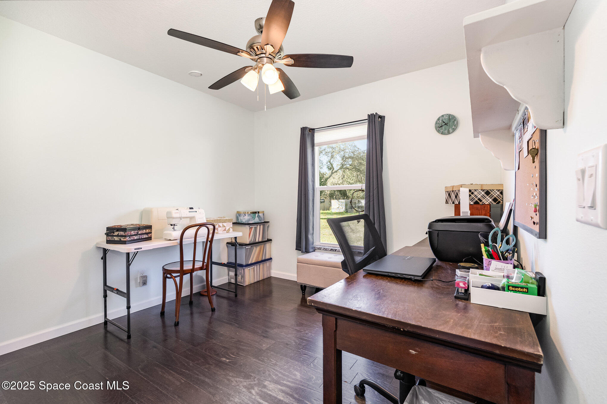 6786 U.S. Rte 1 Mims, FL 32754 - Photo 16 of 33 a workspace with furniture and wooden floor