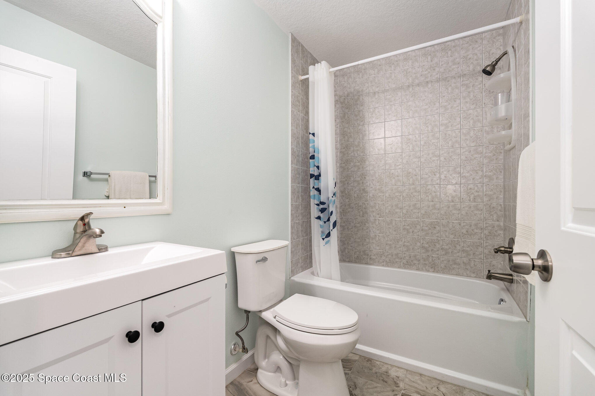 6786 U.S. Rte 1 Mims, FL 32754 - Photo 17 of 33 a bathroom with a sink toilet and shower