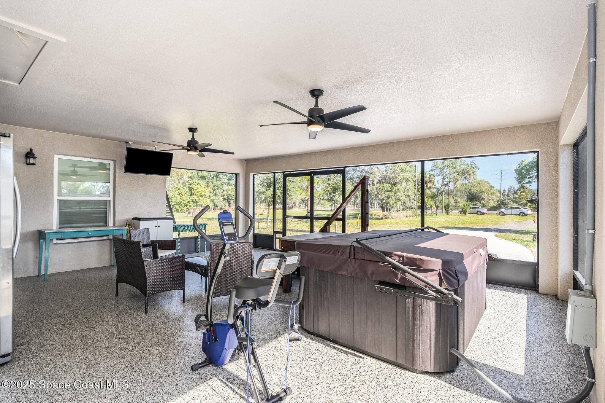 6786 U.S. Rte 1 Mims, FL 32754 - Photo 19 of 33 a living room with furniture and large windows