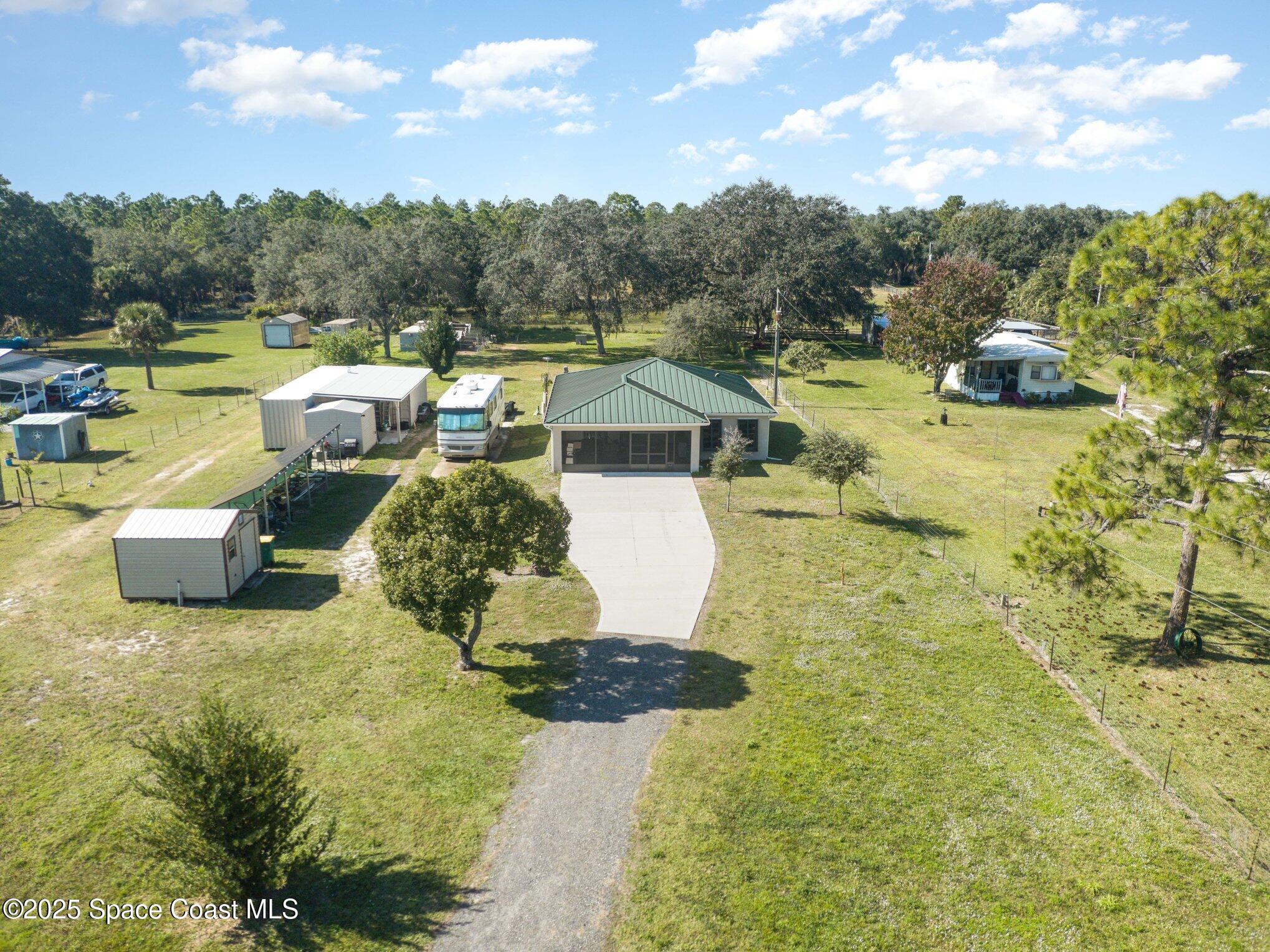 6786 U.S. Rte 1 Mims, FL 32754 - Photo 22 of 33 a picture of city view with lake view