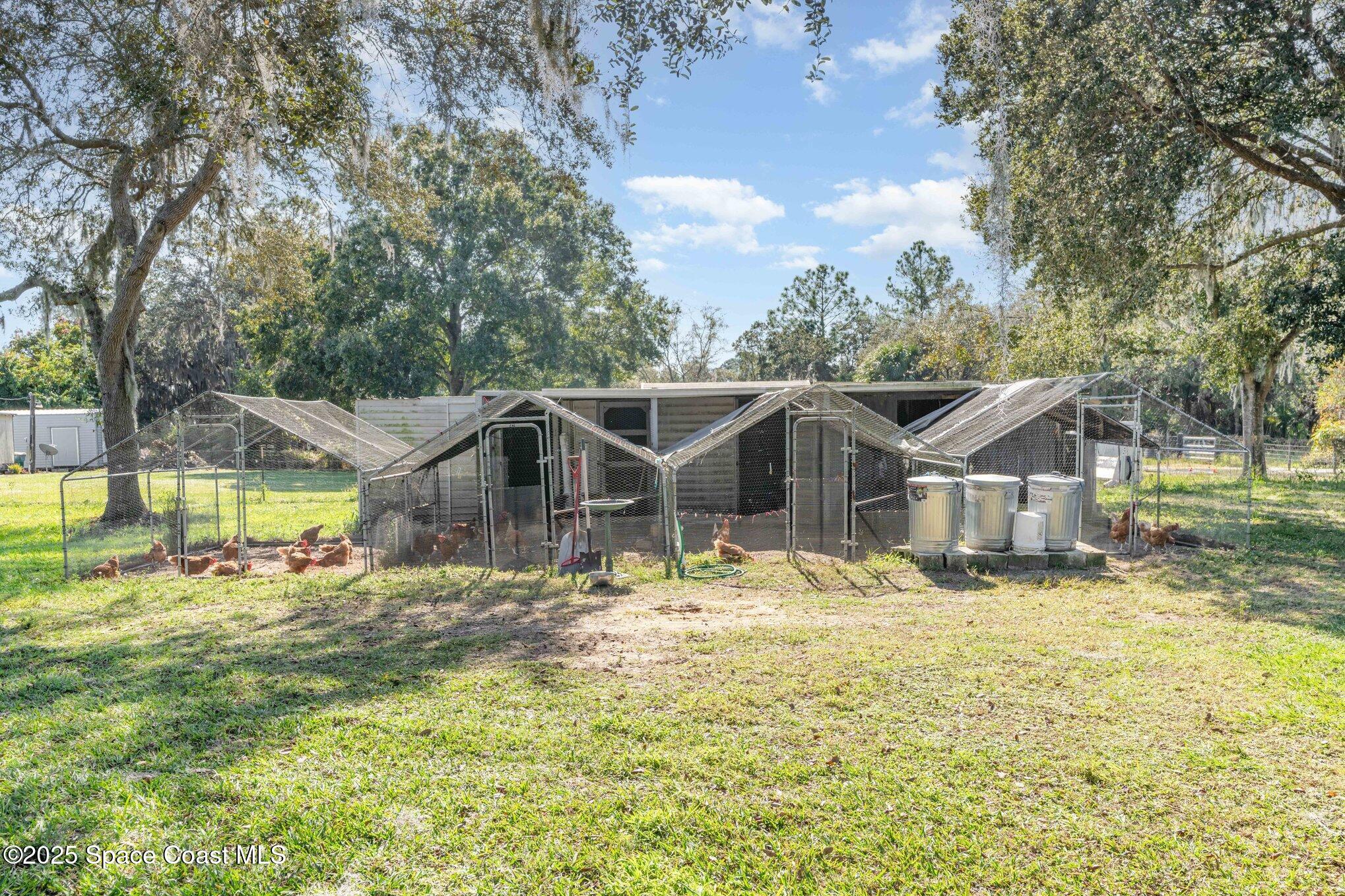 6786 U.S. Rte 1 Mims, FL 32754 - Photo 25 of 33 a view of a house with a yard