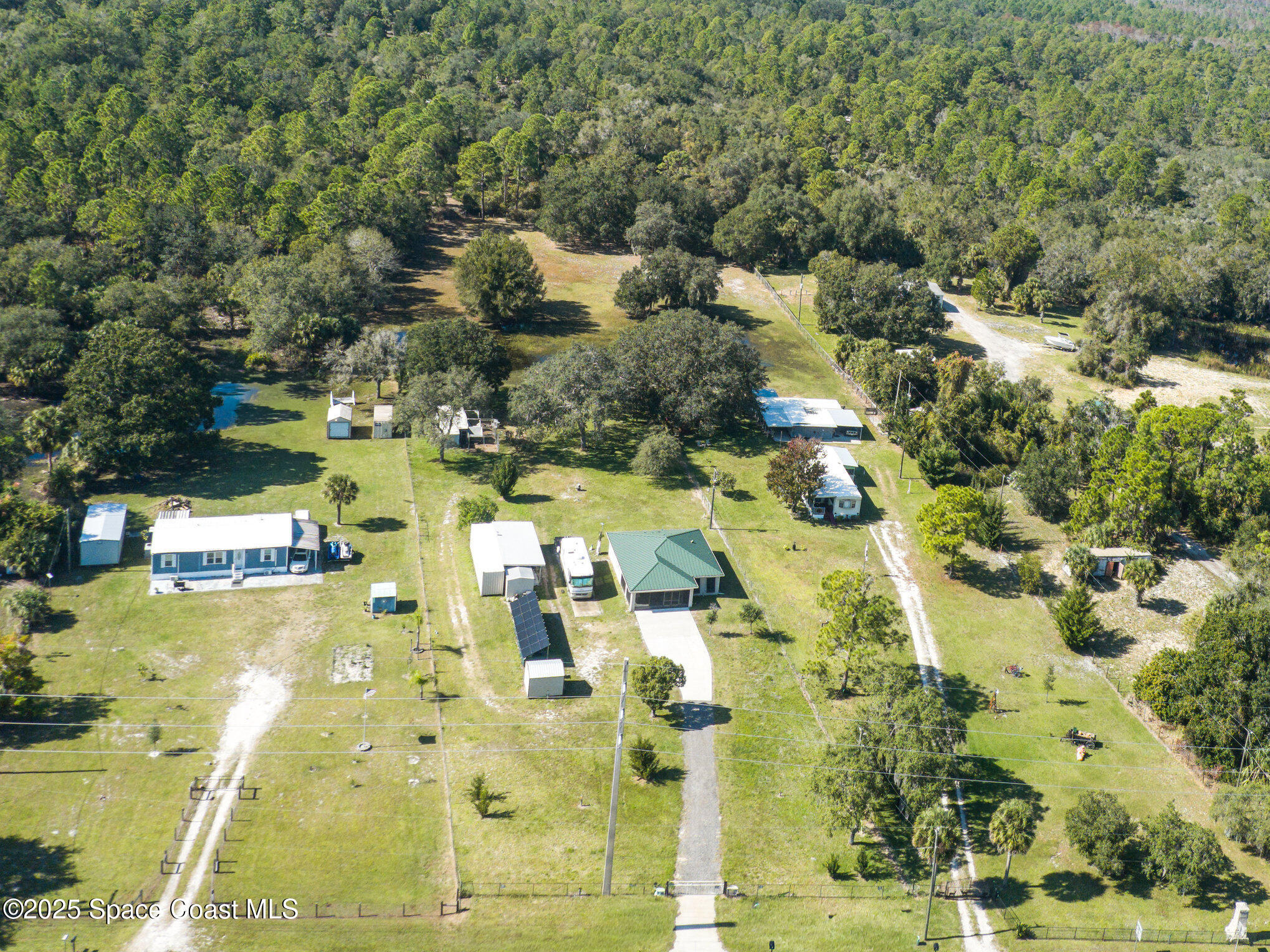 6786 U.S. Rte 1 Mims, FL 32754 - Photo 29 of 33 a aerial view of residential houses with outdoor space