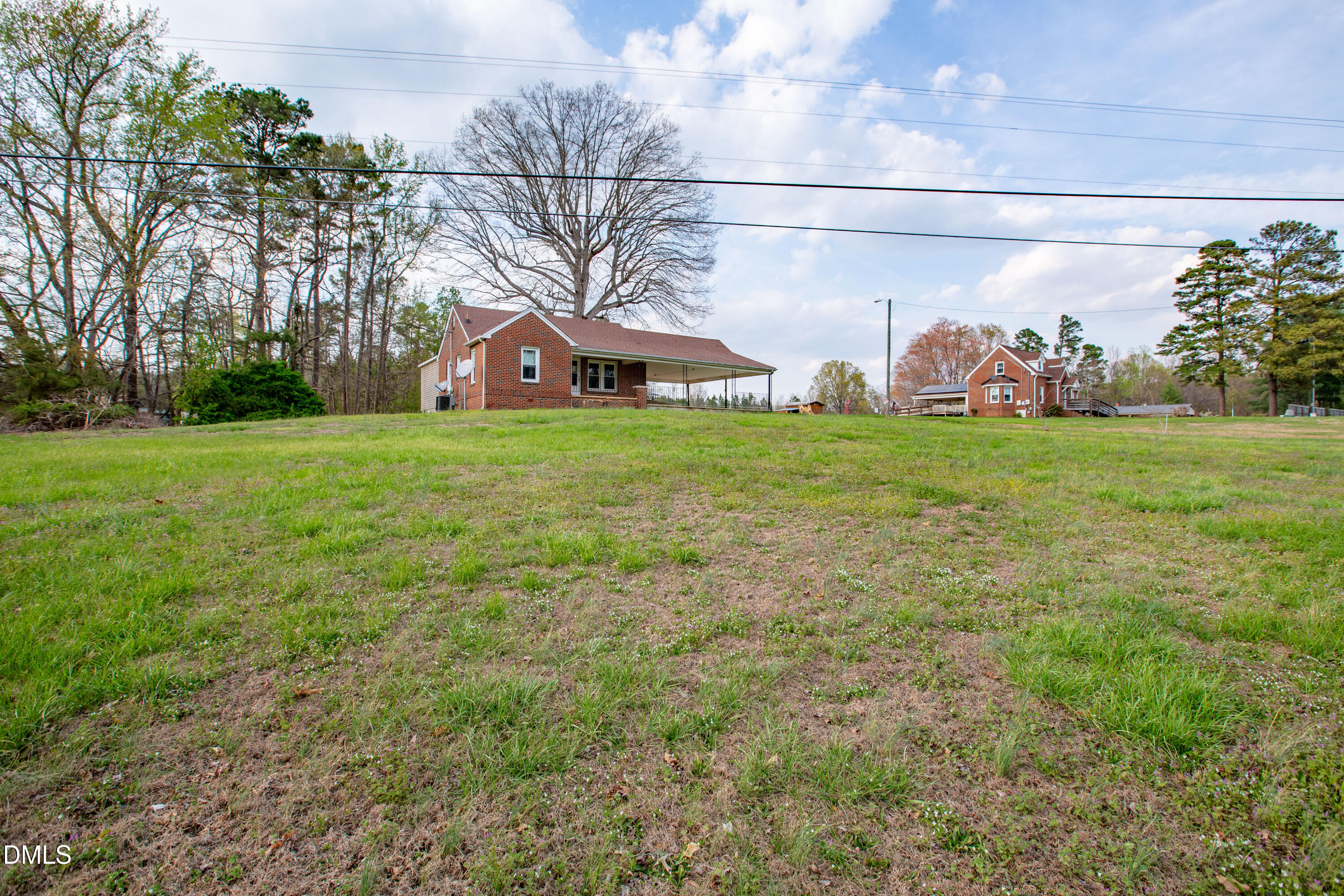 4295 Virgilina Road Roxboro, NC 27574 - Photo 44 of 46 a front view of a house with garden