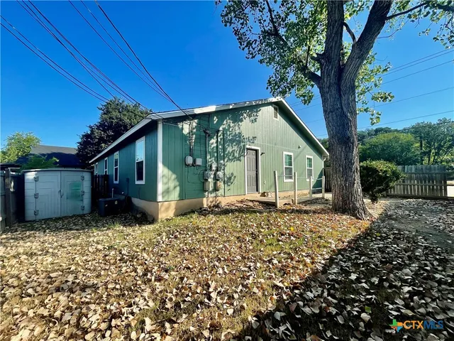 a view of a house with a patio