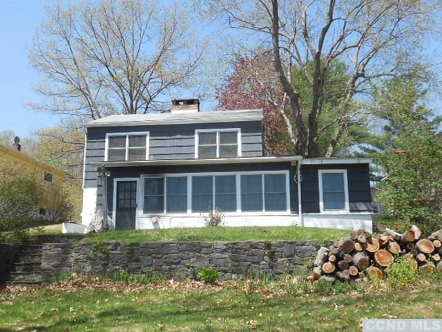 1010 Lakeview Road Copake, NY 12516 - Photo 1 of 10 front view of a house with a yard