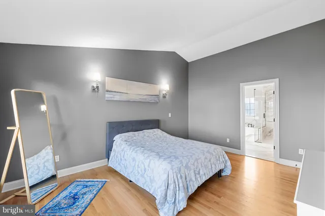 a bathroom with a tub and a shower