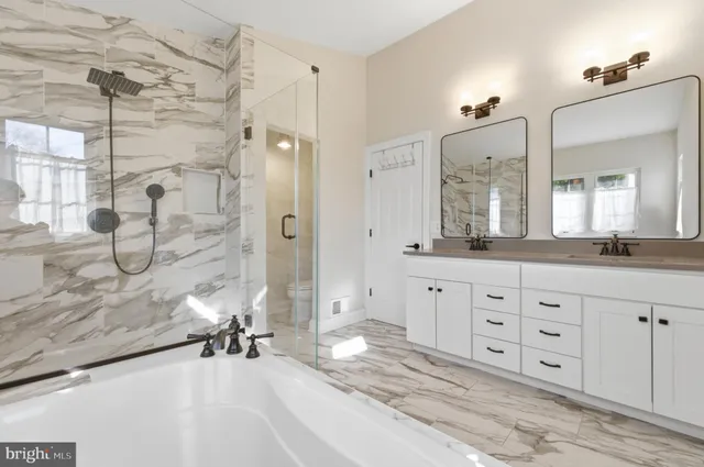 a bedroom with a bed and a chair