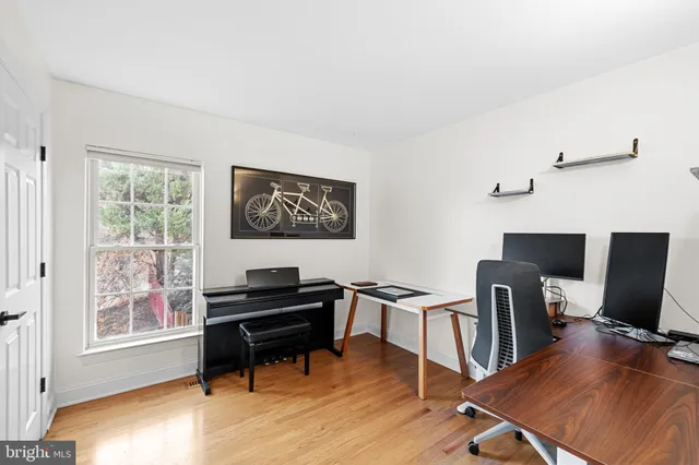 a front view of a house with a large window