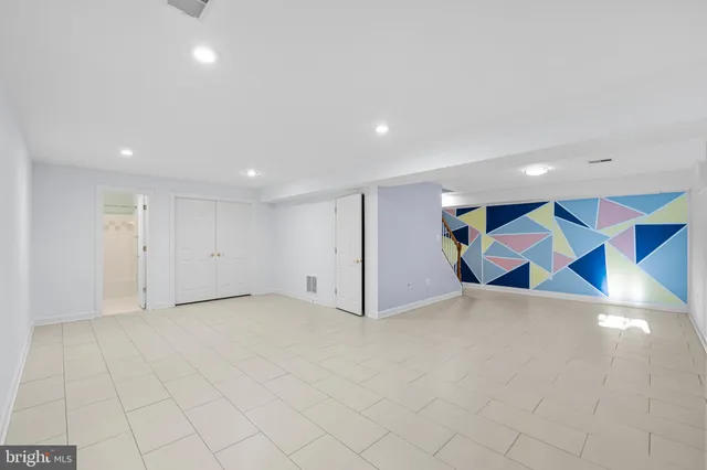 a view of a small house with a yard