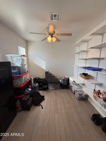 a spacious bathroom with a double vanity sink a mirror and a bathtub