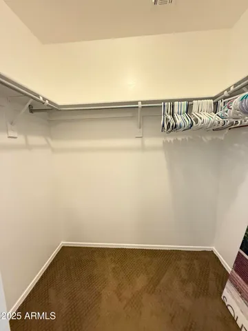 a outdoor sitting area with furniture and a yard