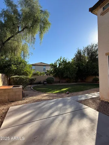 a view of a swimming pool with a porch