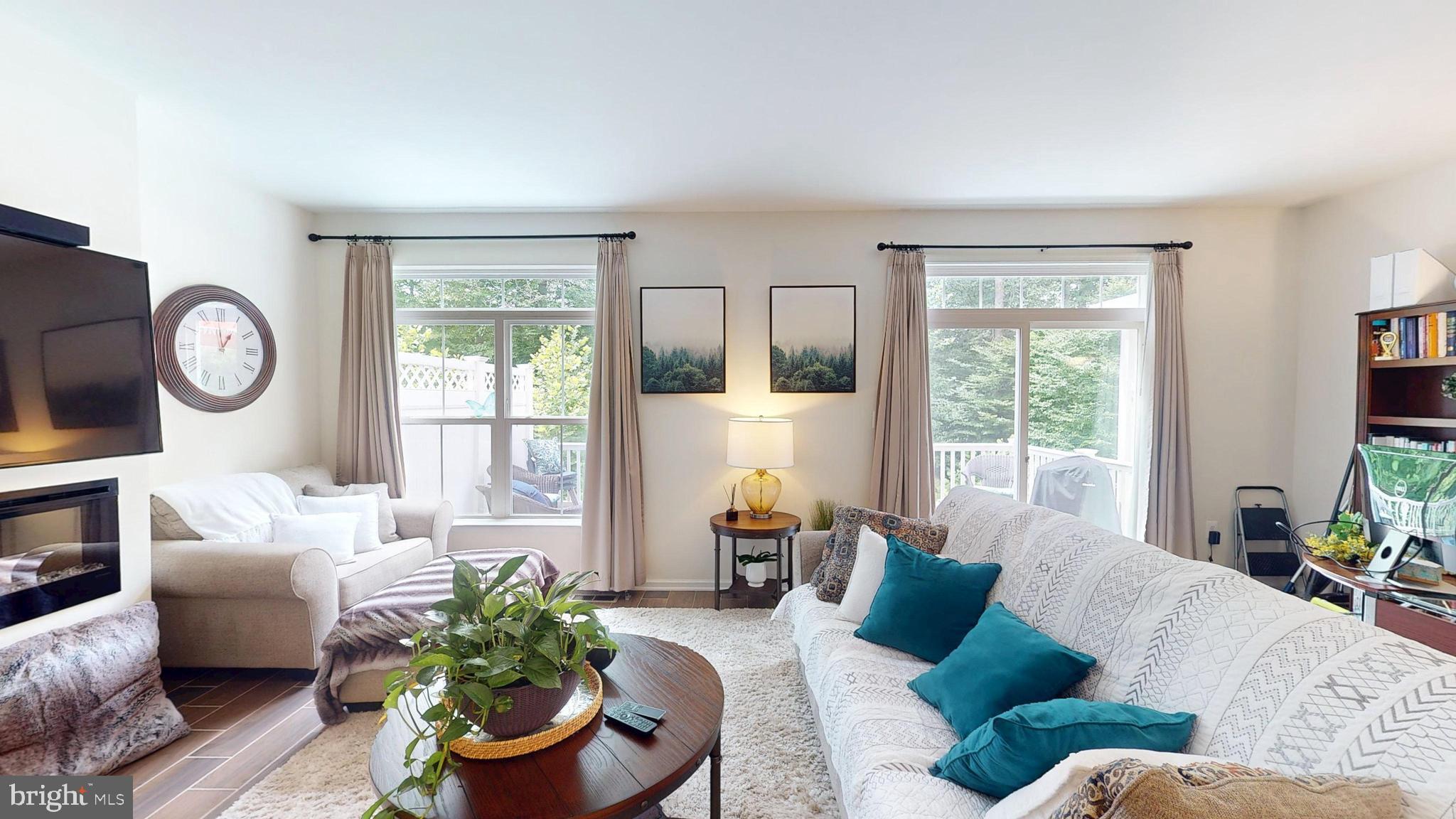 15103 Hogshead Way Upper Marlboro, MD 20772 - Photo 20 of 44 a living room with furniture and a large window