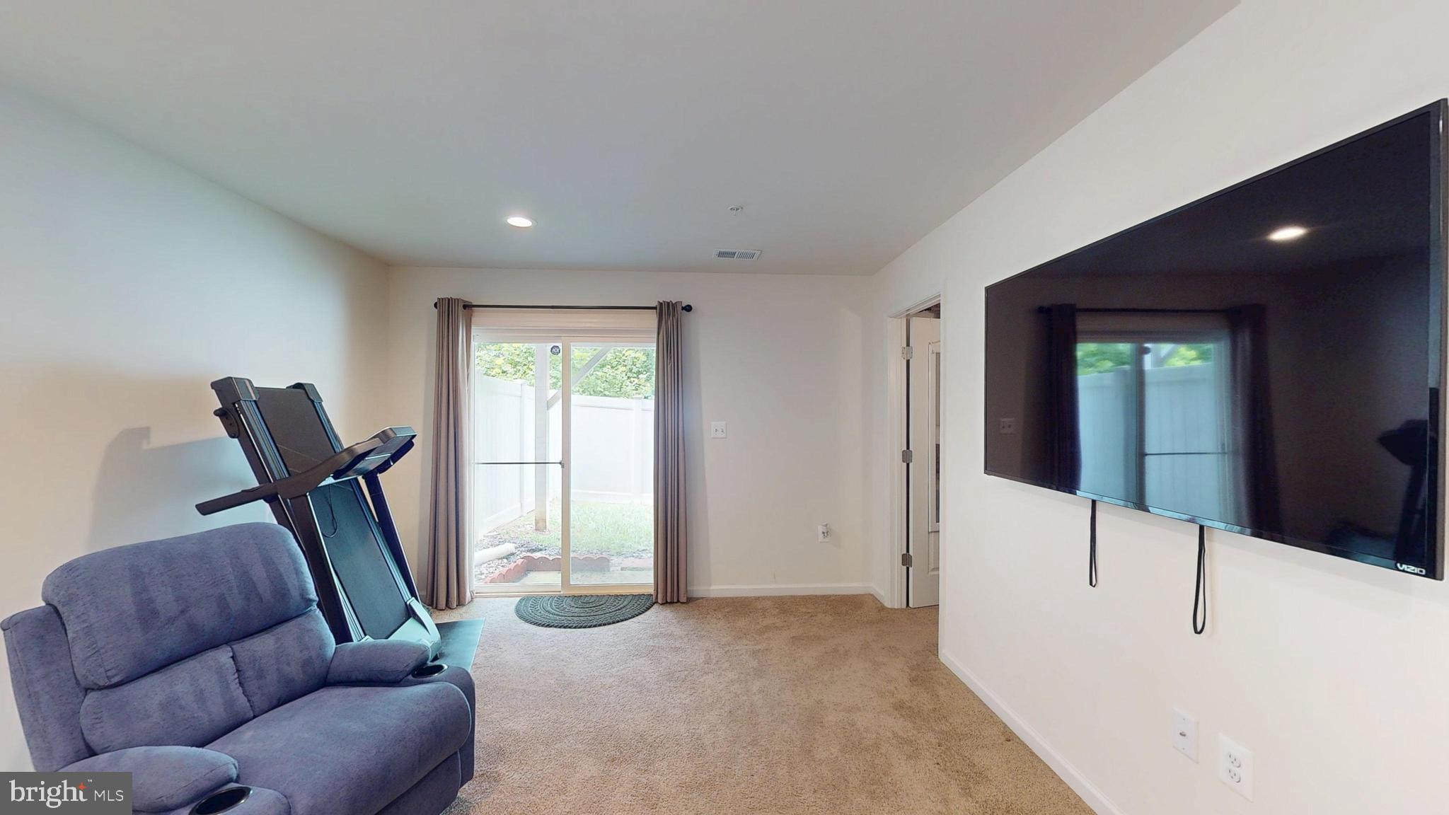 15103 Hogshead Way Upper Marlboro, MD 20772 - Photo 39 of 44 a view of a livingroom with furniture and windows