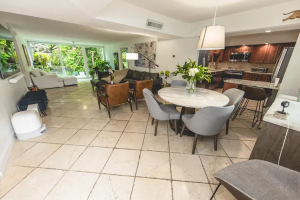 a living room with patio furniture