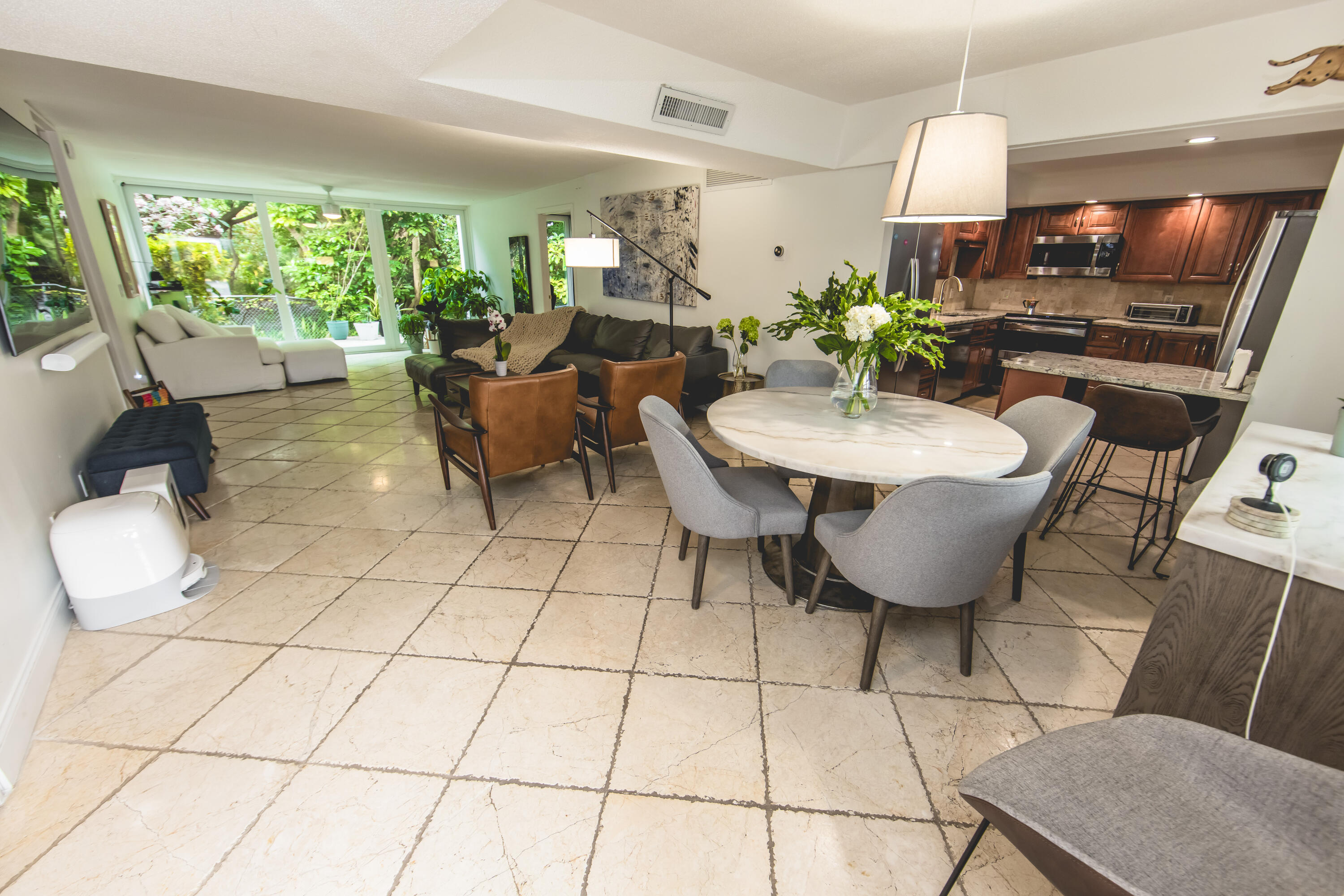 501 Southwest 11th Place, Unit 101 Boca Raton, FL 33432 - Photo 7 of 22 a living room with furniture