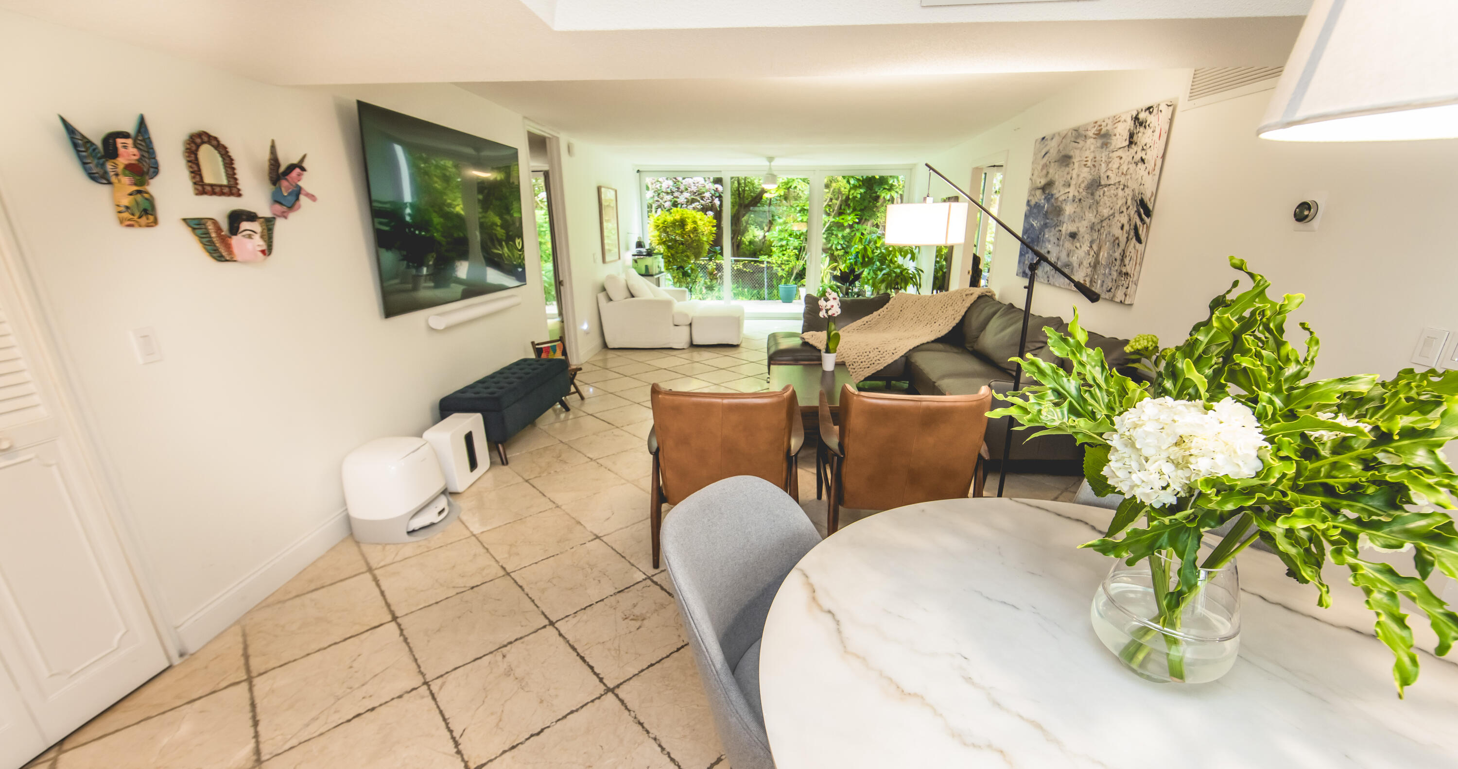 501 Southwest 11th Place, Unit 101 Boca Raton, FL 33432 - Photo 8 of 22 a living room with patio furniture