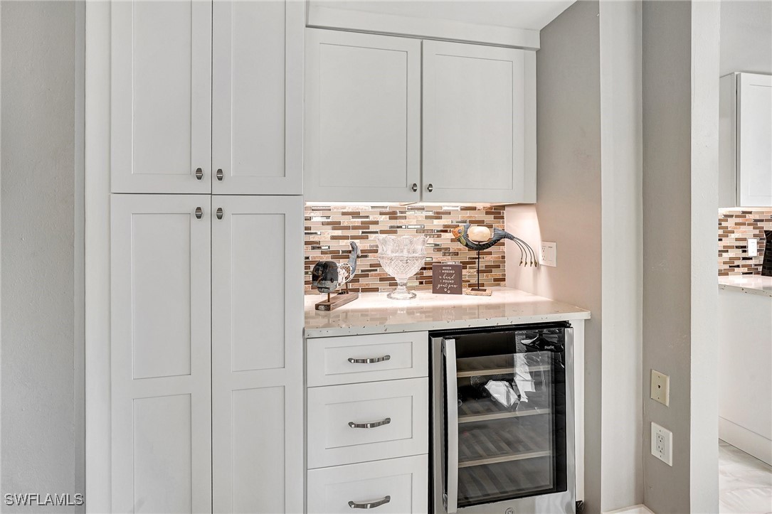 1900 Virginia Avenue, Unit 103 Fort Myers, FL 33901 - Photo 20 of 45 a bathroom with a sink and cabinets
