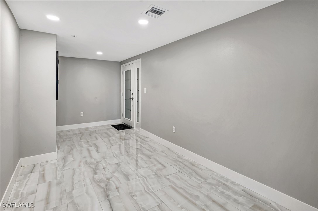 1900 Virginia Avenue, Unit 103 Fort Myers, FL 33901 - Photo 4 of 45 a view of an empty room