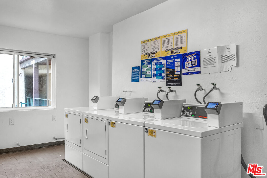 5460 White Oak Avenue, Unit D309 Encino, CA 91316 - Photo 19 of 22 a bathroom with a sink and a mirror