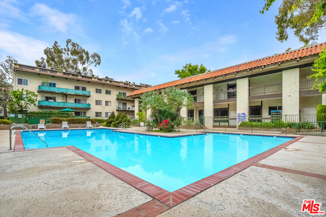 5460 White Oak Avenue, Unit D309 Encino, CA 91316 - Photo 22 of 22 swimming pool with outdoor seating